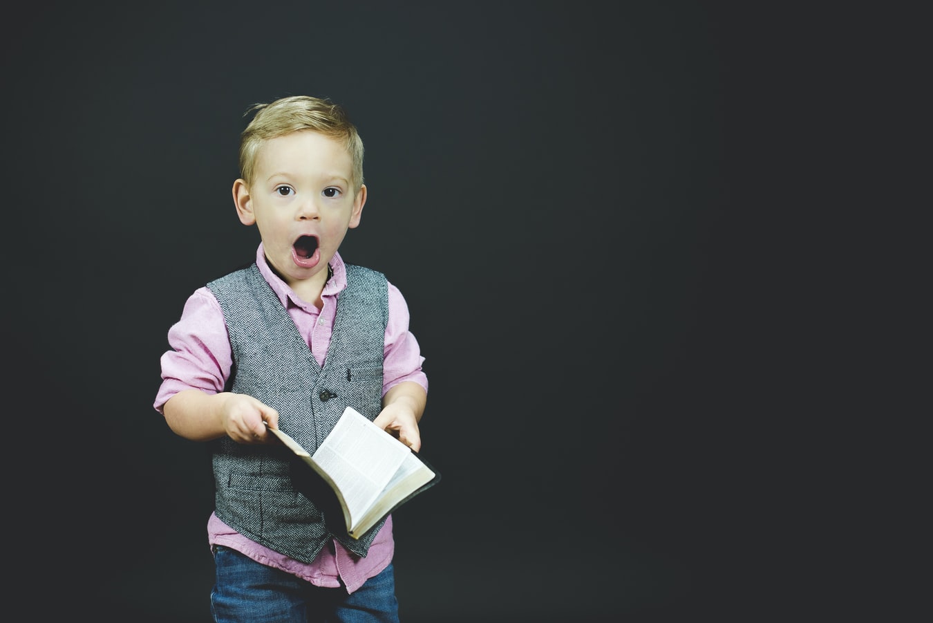 little kid reading