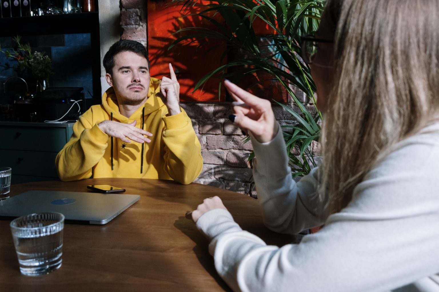 people talking in sign language