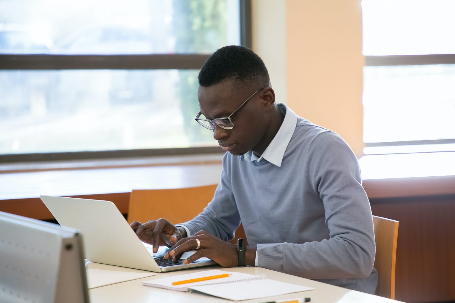 man working on laptop