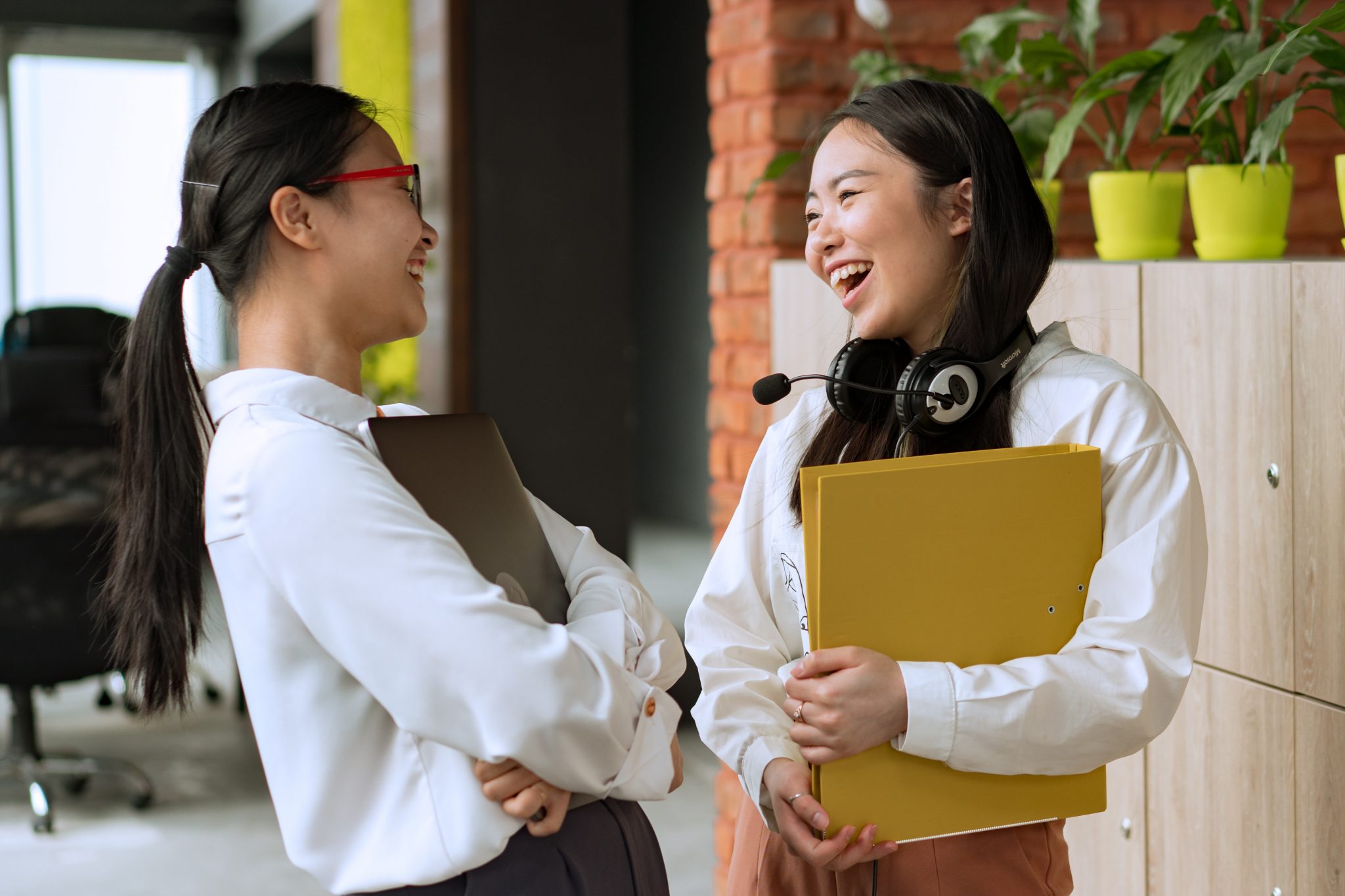 women talking in an office