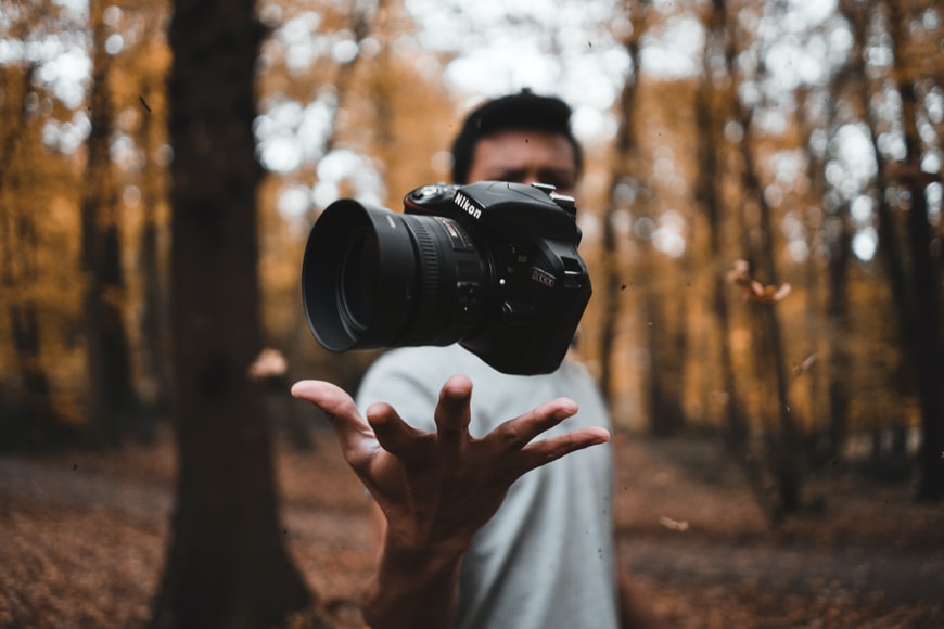 man holding camera