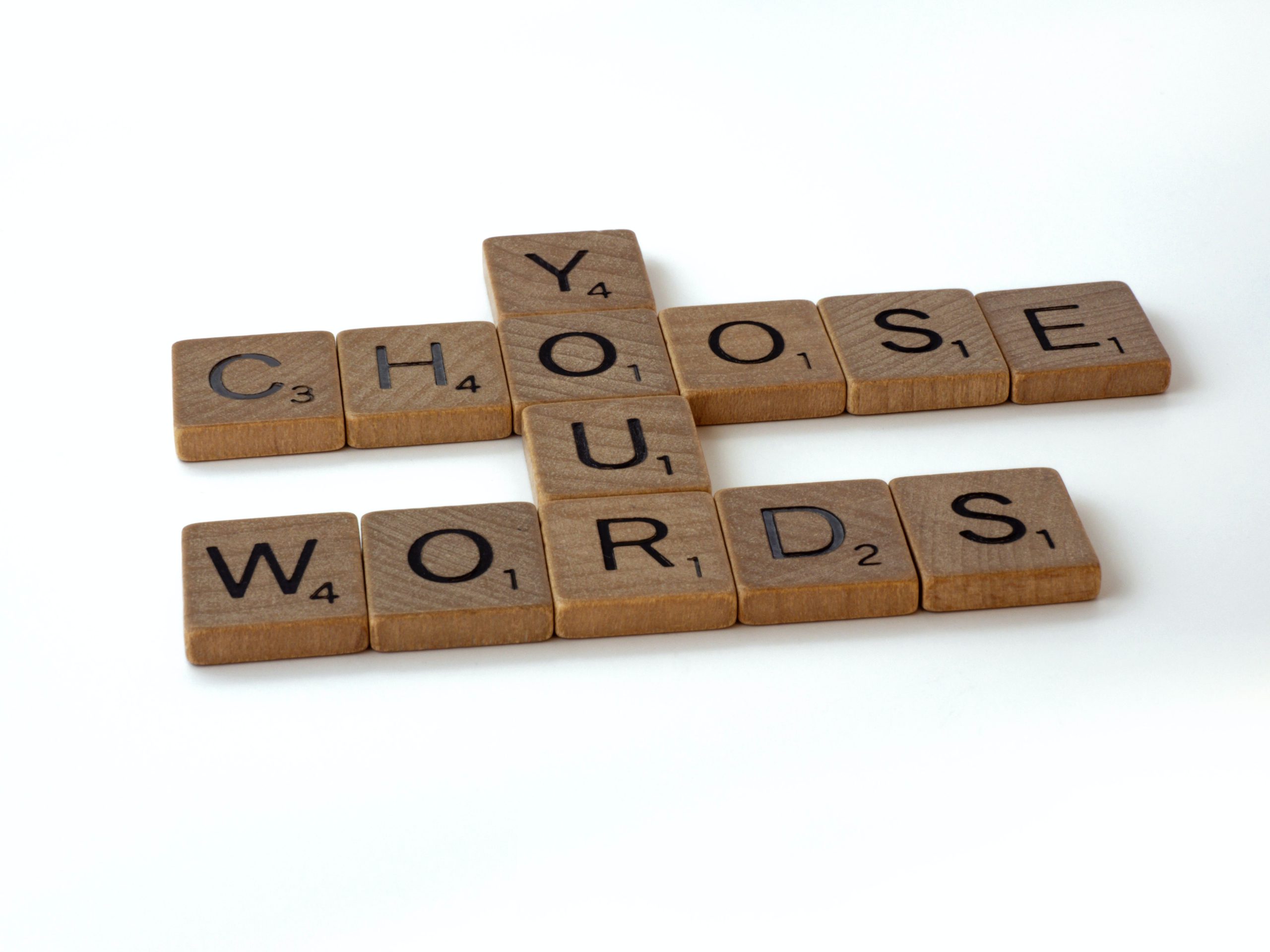 "choose your words" written in scrabble letters