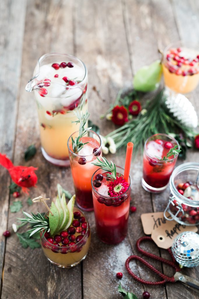 holiday cocktails with pine garnish